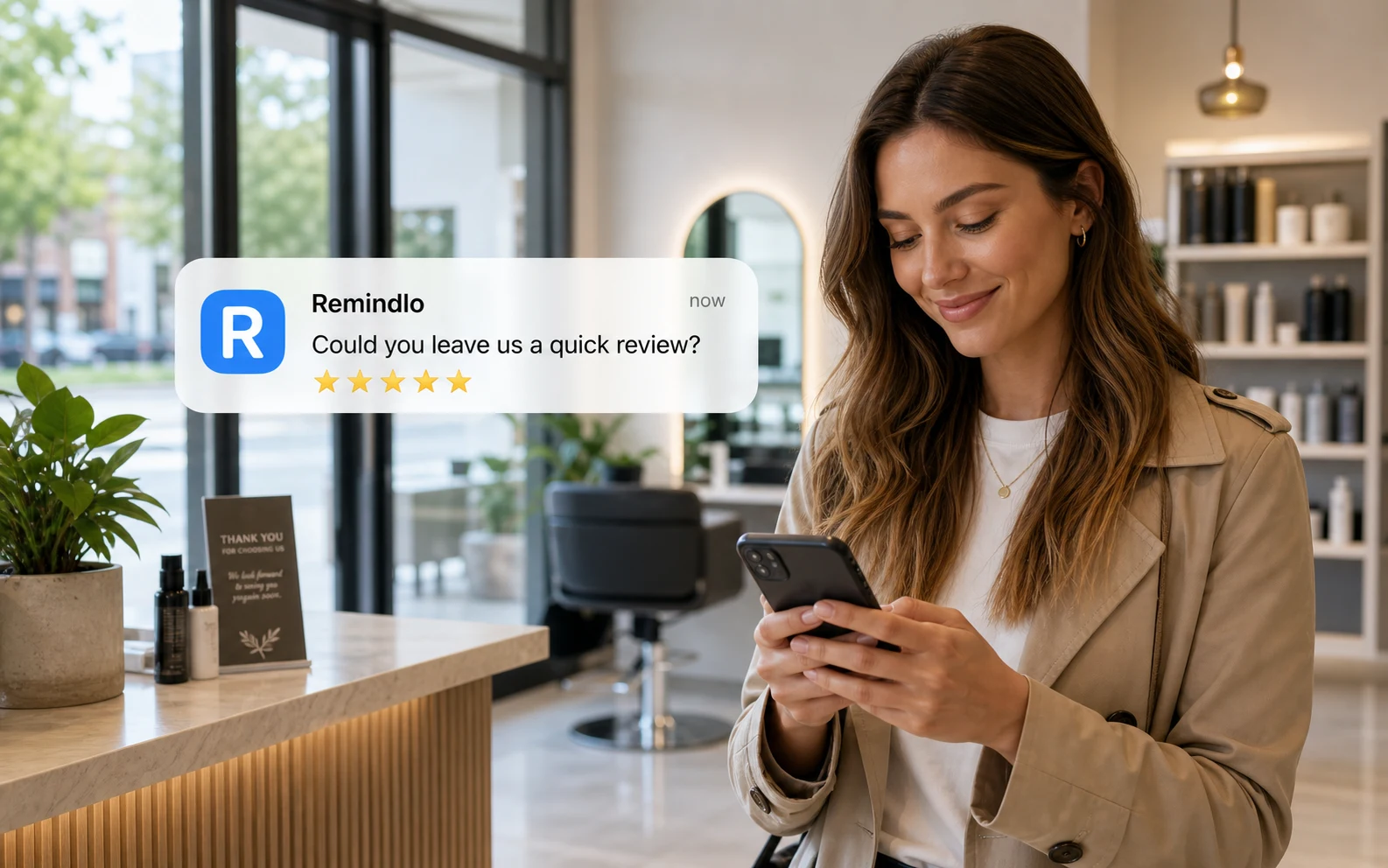 Customer receiving a Remindlo SMS asking for a review after a positive service visit